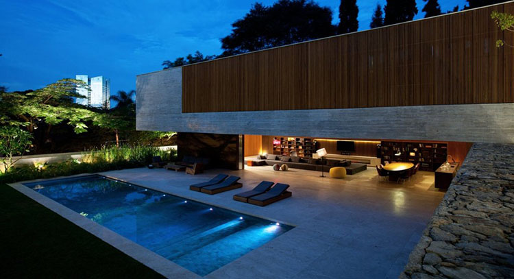 Luxury Deck Ideas - villa with stone deck with swimming pool on ground level - LifetimeLuxury021