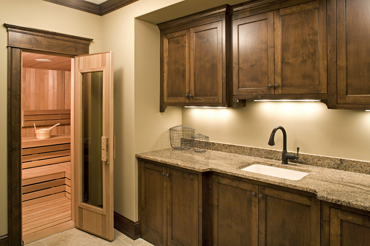 Luxury Home Sauna - kitchen with an open door on the left leading into a sauna - LifetimeLuxury129