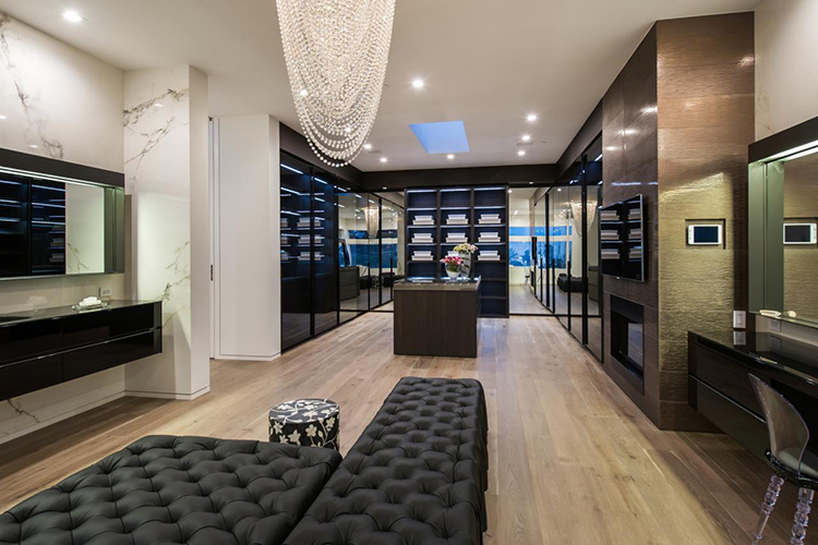 Lifetime Luxury - Luxury Closet Ideas037 - modern dark walnut wooden closet with glass panel windows in a big combined space -