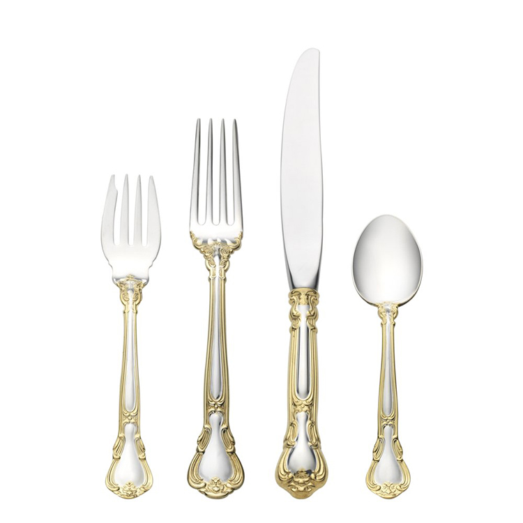 07. Best flatware sets gallery - Chantilly gold accent - tow forks, one knife and one spoon in silver with golden decorations